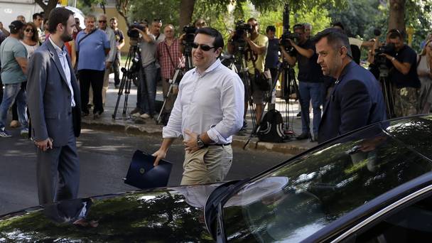 Greek Prime Minister Alexis Tsipras votes at a polling station in Athens