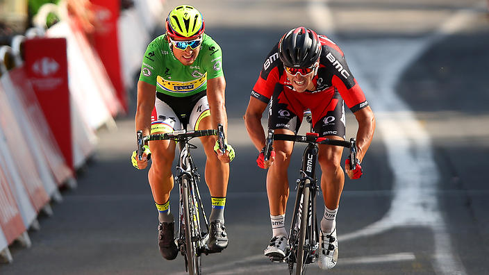 Greg van Avermaet crosses the finish line ahead of Peter Sagan at the end of Stage 13 of the 2015 Tour de France