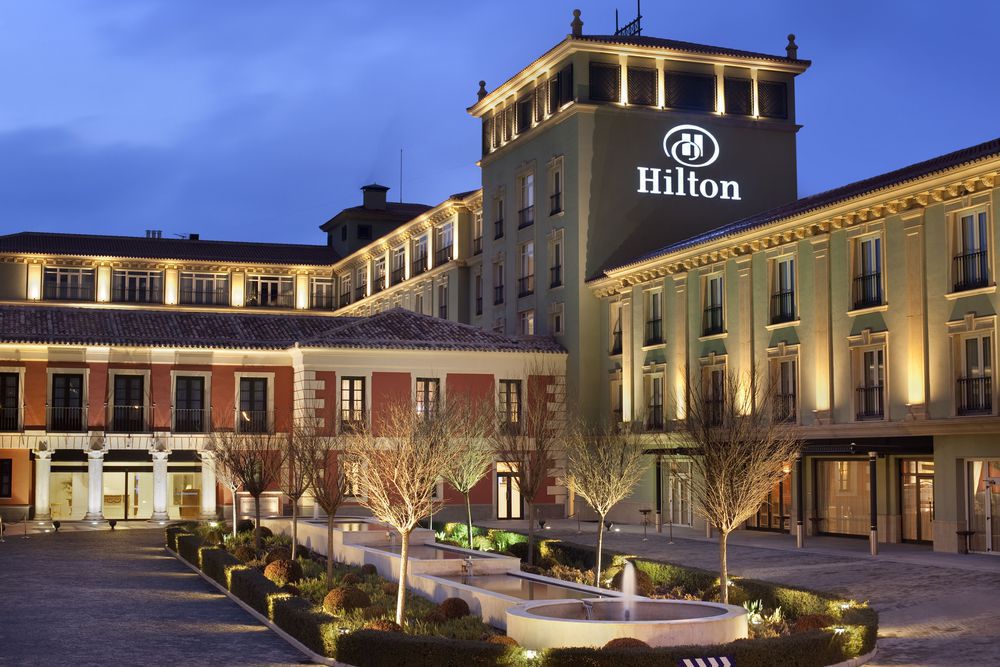 Hilton's profit slides as expenses climb