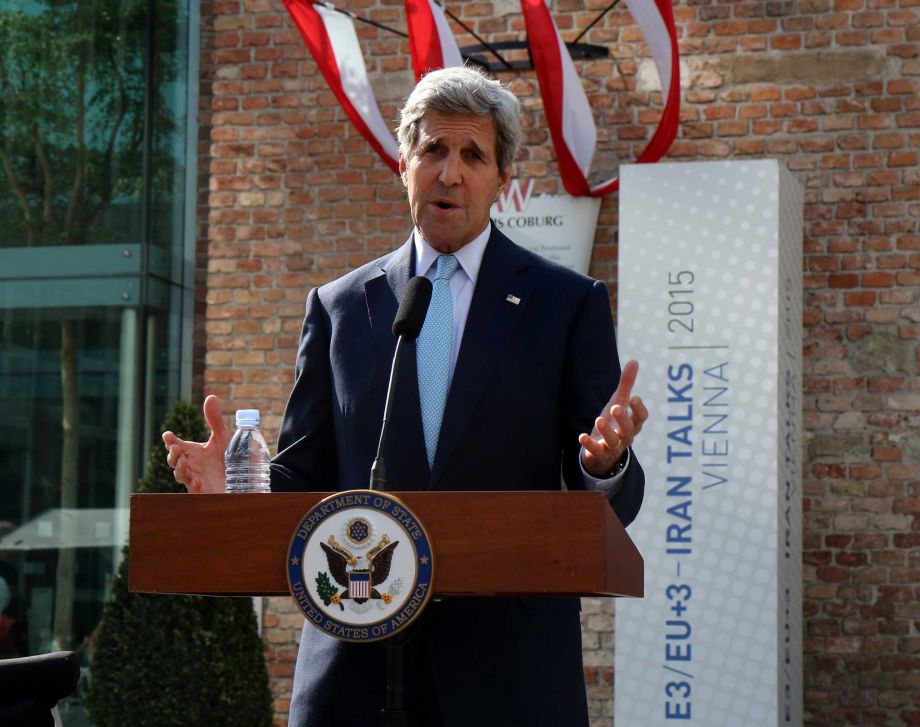 U.S. Secretary of State John Kerry informs the media in front of Palais Coburg where closed-door nuclear talks with Iran take place in Vienna Austria Sunday