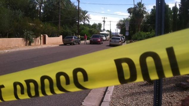 Police found the decapitated bodies of a woman and two dogs inside an apartment in north Phoenix Ariz. on Saturday morning