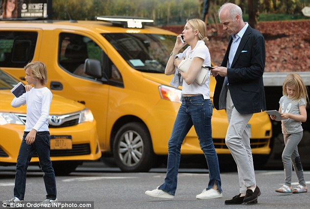 Tense Kelly Rutherford was seen out in New York City on Thursday with son Hermes eight and daughter Helena six hours after a judge ruled that the California court has no jurisdiction over the children