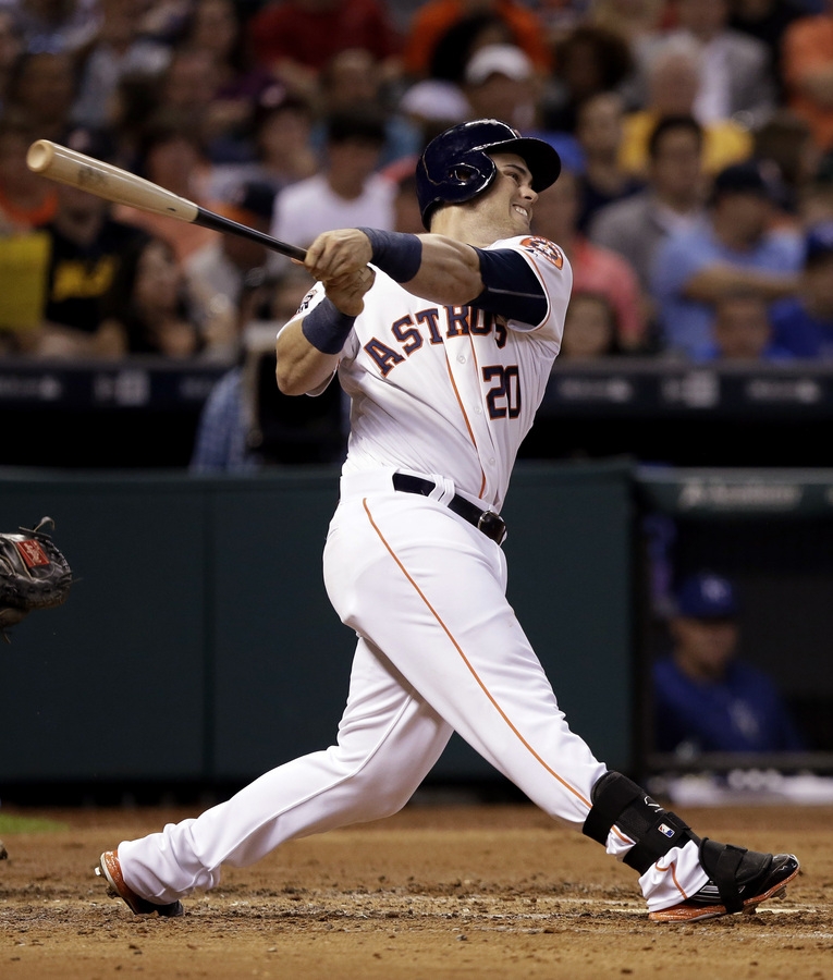 Houston's Preston Tucker swings for an RBI single against Kansas City in the third inning of Monday's game in Houston. The Astros won 6-1