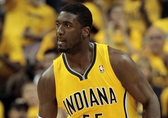 Indiana Pacers center Roy Hibbert reacts after making a basket early in the first half during Game 7 of a first-round NBA basketball playoff series against the Atlanta Hawks in Indianapolis Saturday