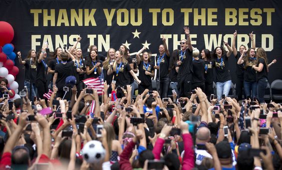 U.S. women's soccer team and fans celebrate the team's World Cup championship during a public celebration Tuesday