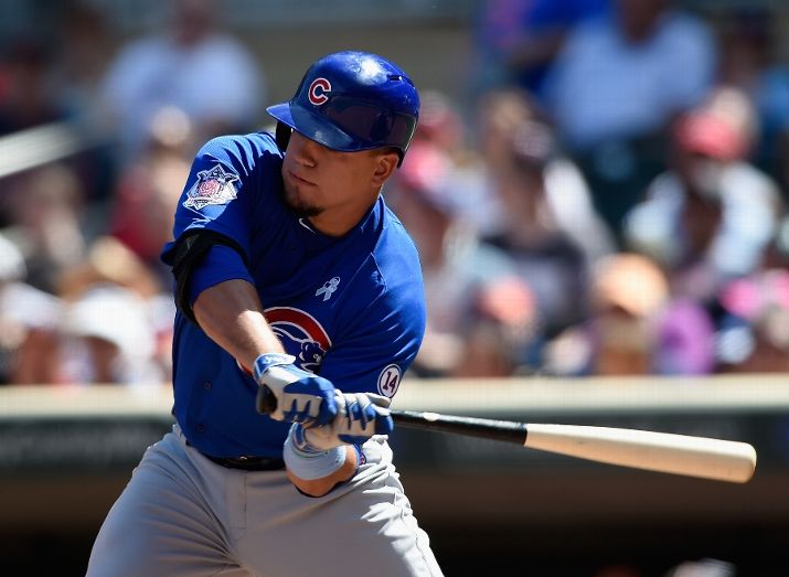 MINNEAPOLIS MN- JUNE 21 Kyle Schwarber #12 of the Chicago Cubs hits a two-run single against the Minnesota Twins during the eighth inning of the game