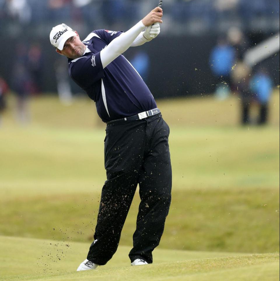 Australias Marc Leishman plays his second shot on the 16th during the third round at the British Open Golf Championship at the Old Course St. Andrews Scotland Sunday