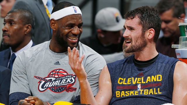 Love to stay with Cavs sign reported $110M deal           					Le Bron James chats with Kevin Love during the season