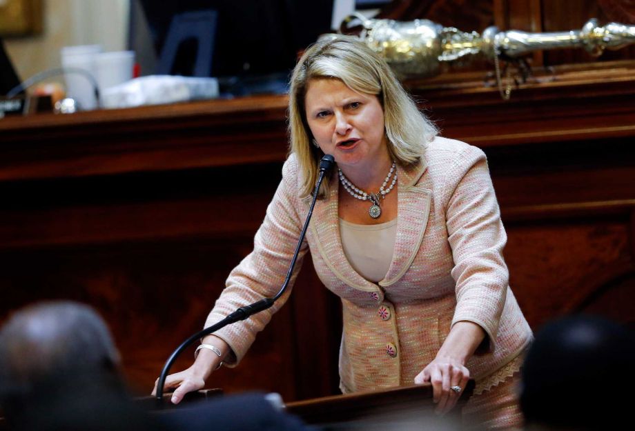 Rep. Jenny Horne R-Summerville speaks in favor of taking down the Confederate flag during debate over a Senate bill calling for the flag to be removed from the Capitol grounds Wednesday