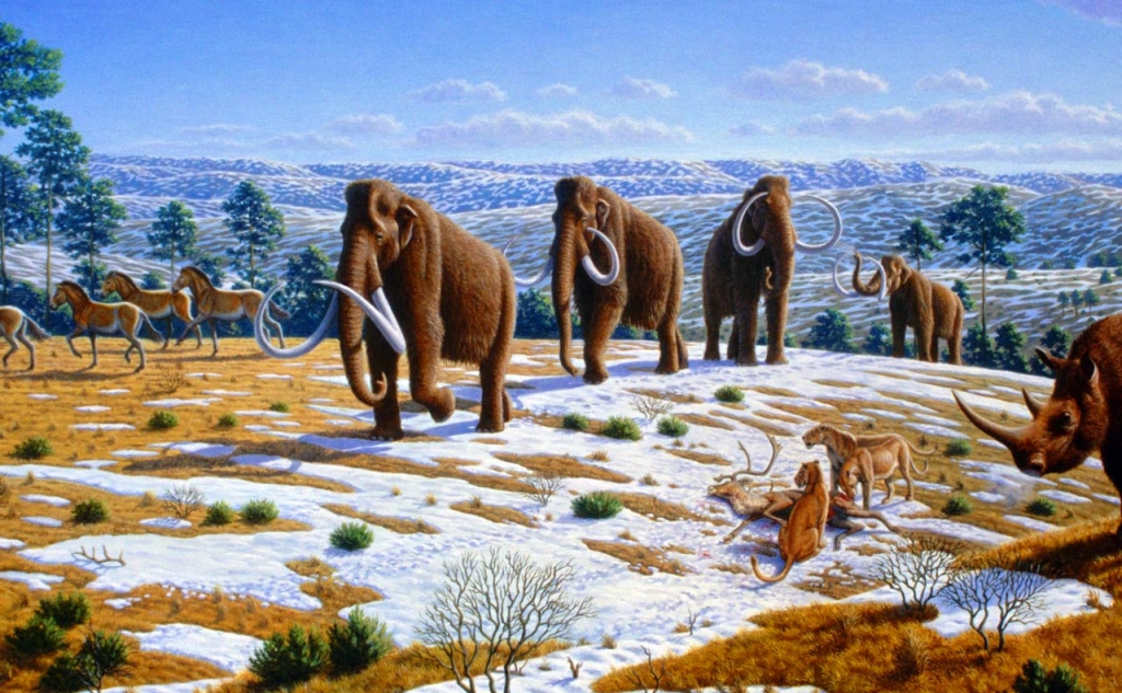 This image depicts a Pleistocene landscape in northern Spain with woolly mammoths, equids a woolly rhinoceros, and European cave lions. Image credit Mauricio Anton