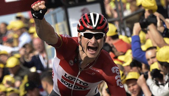 Greipel celebrates as he crosses the finishing line