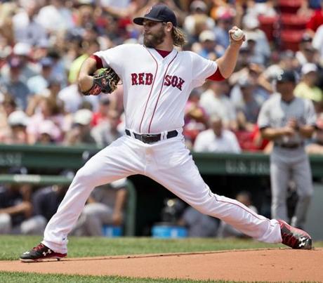 Boston MA 7/12/15 Boston Red Sox starting pitcher Wade Miley delivers a pitch against the New York Yankees during first inning action at Fenway Park on Sunday