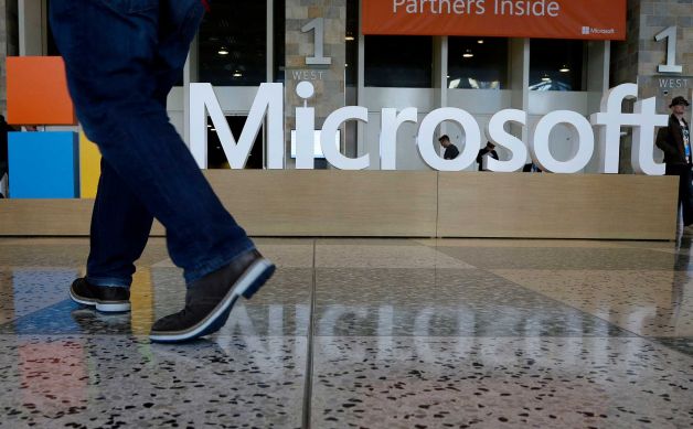 Microsoft books $8.4 billion write-down on phones in 4Q