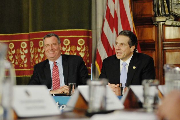 New York Mayor Bill de Blasio left and New York Governor Andrew Cuomo take part in a press conference at the capitol on Monday Jan. 27 2014 in Albany NY. The Governor and the Mayor along with city legislators held the press conference to discuss the