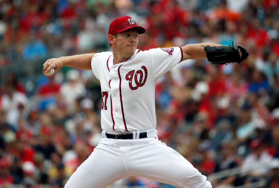 Washington Nationals starting pitcher Stephen Strasburg throws during the fourth inning of a baseball game against the San Francisco Giants at Nationals Park Saturday