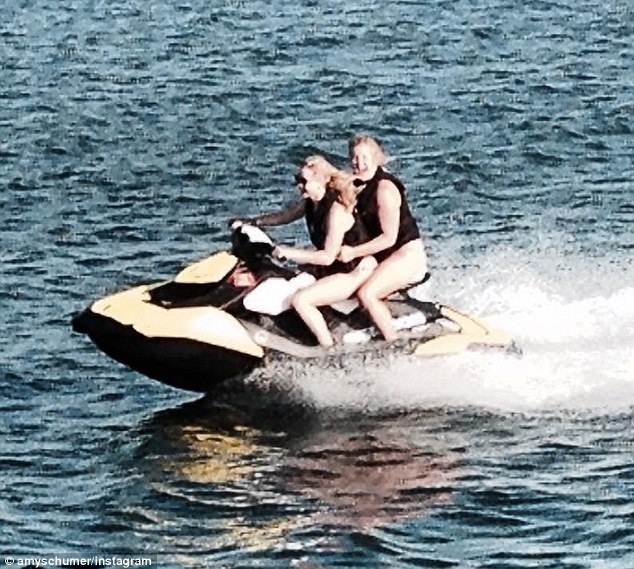 New BFFs Amy Schumer is seen riding on a jet ski with Jennifer Lawrence in an Instagram