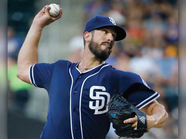 Hart High graduate and San Diego Padres pitcher James Shields delivers a pitch against the New York Mets in New York on Tuesday. Associated Press