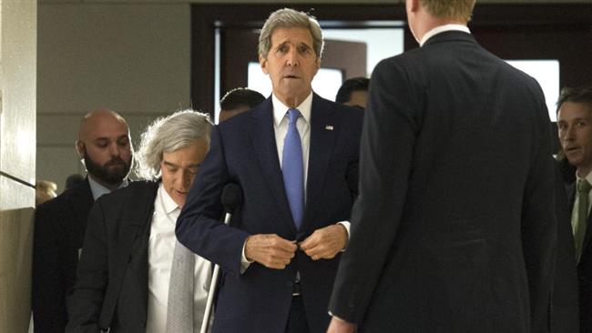 Kerry and Moniz arrive for a classified briefing for House members on Capitol Hill in Washington