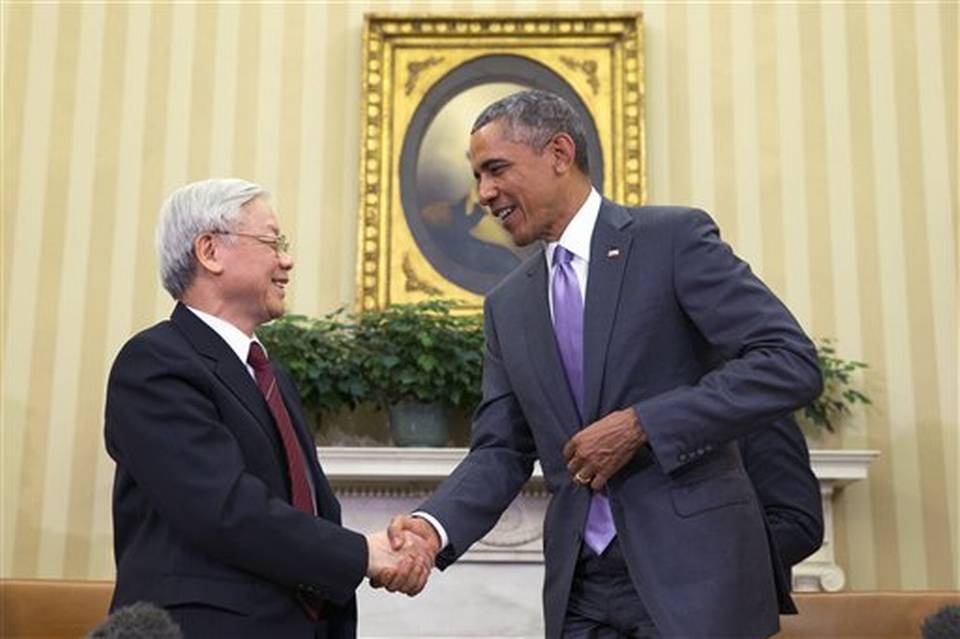 President Barack Obama right meets with Vietnamese Communist party secretary general Nguyen Phu Trong in the Oval Office of the White House on Tuesday