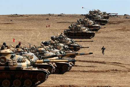 Turkey reinforces Syria border, Davutoglu says no incursion planned - Yahoo