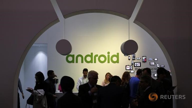 S People visit an Android stand at the Mobile World Congress in Barcelona