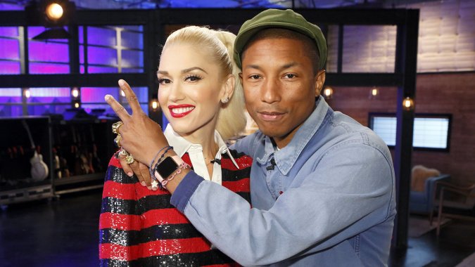 Pharrell Williams with Gwen Stefani wearing an Apple Watch