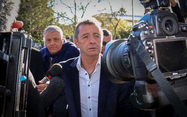 Phil Rudd arriving at the Tauranga District Court this morning