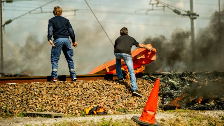 Philippe Huguen AFP  | Protesting MyFerryLink sailors lit fires on Eurostar train tracks