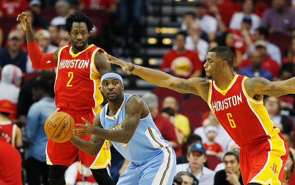 Ty Lawson #3 against two Houston Rockets players