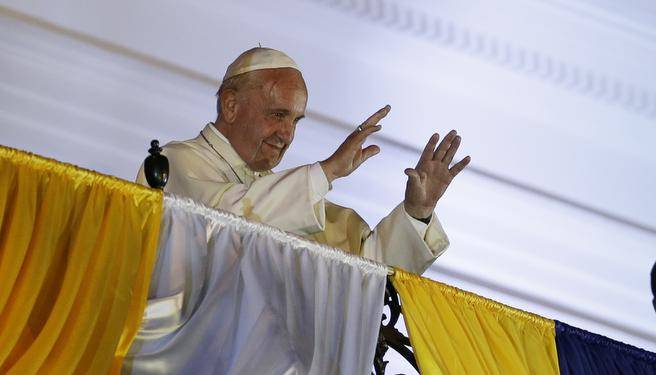 Pope Francis blesses the faithful gathered at independence square in Quito Ecuador on Monday