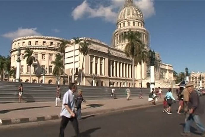 President Obama announces re-establishment of diplomatic ties promising a U.S. flag will fly over an embassy in Havana this summer