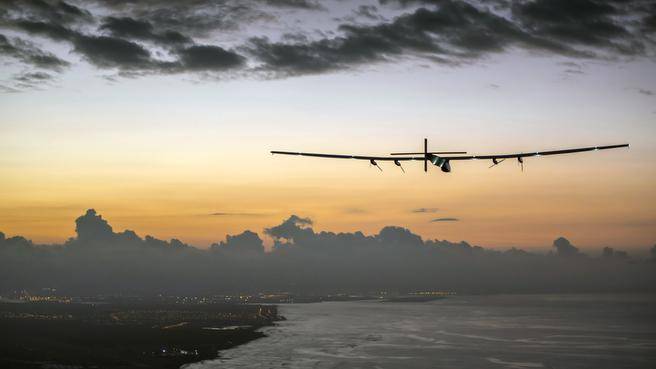 Solar Impulse 2 a plane powered by the sun's rays and piloted by Andre Borschberg approaches Kalaeloa Airport near Honolulu Friday