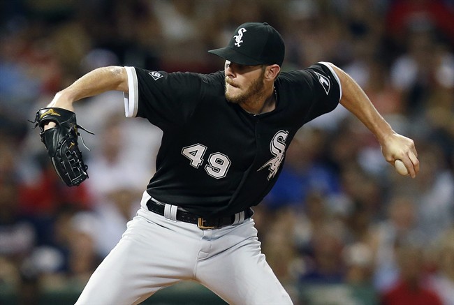 Chicago White Sox's Chris Sale pitches during the first inning of a baseball game against the Boston Red Sox in Boston Thursday