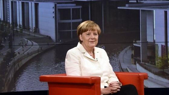 German Chancellor Angela Merkel waits for the start of the annual summer interview of German broadcaster ARD at the station's capital studio in Berlin