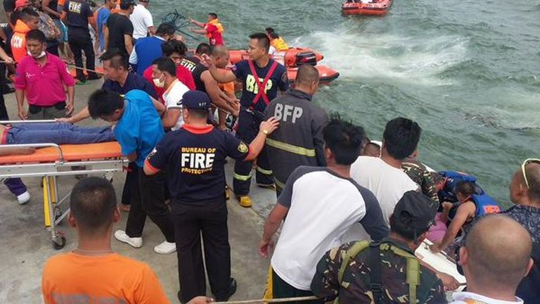 Rescue operations underway after a ferry capsized off Ormoc City.
   
 

  Enlarge  Caption