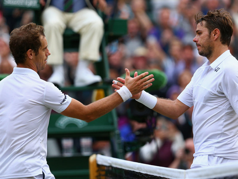 Richard Gasquet greets Stan Wawrinka at the end of the match