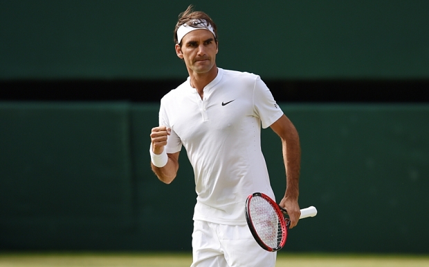 Roger Federer celebrates during his win against Andy Murray