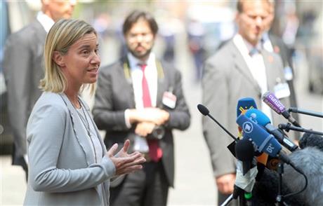 European Union High Representative Federica Mogherini talks to media in front of Palais Coburg where closed-door nuclear talks with Iran take place in Vienna Austria Tuesday