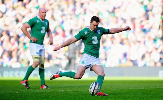 Ireland fly half Jonathan Sexton kicks a penalty watched by Paul O&#039 Connell during the RBS Six Nations match between Scotland and Ireland at Murrayfield