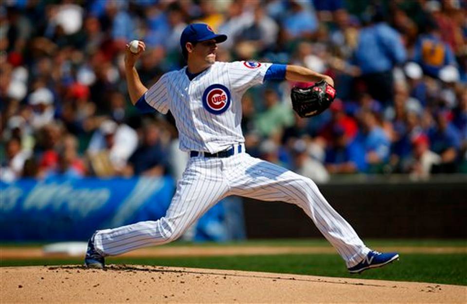 Chicago Cubs starting pitcher Kyle Hendricks throws during the first inning of a baseball game against the Chicago White Sox in Chicago on Friday