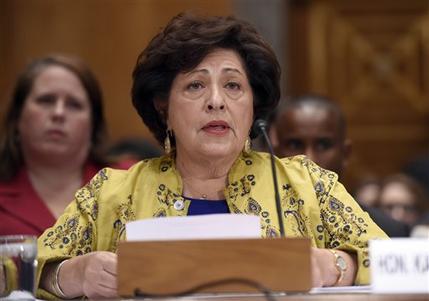 Office of Personnel Management director Katherine Archuleta testifies on Capitol Hill in Washington. The Obama administration says hackers stole Social Security numbers from more than 21 million people and