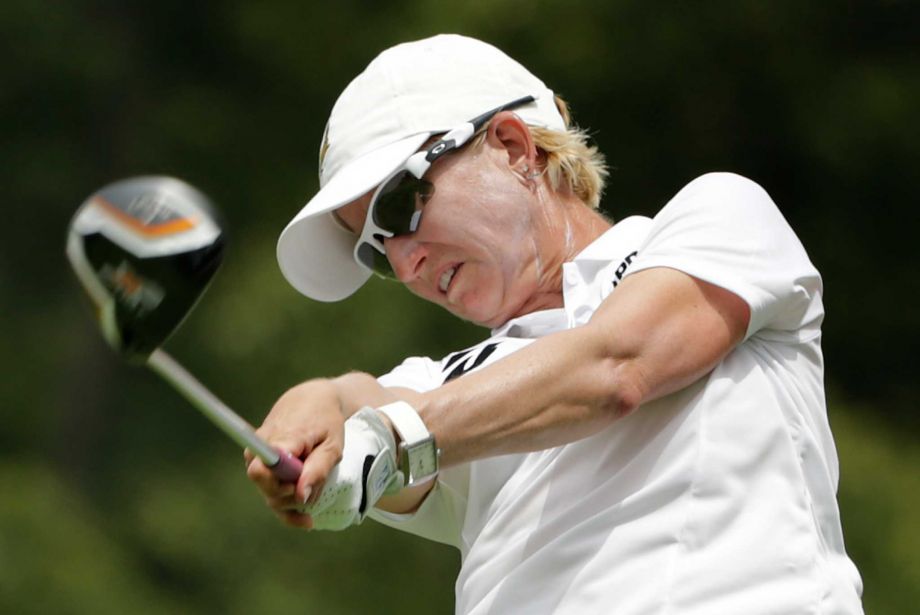 Karrie Webb of Australia tees off the ninth hole during the first round of the U.S. Women's Open golf tournament at Lancaster Country Club Thursday