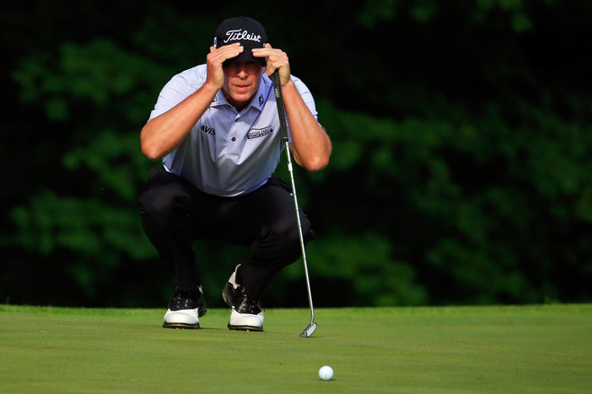 Steve Stricker lines up a put on the 11th green Thursday at the John Deere Classic