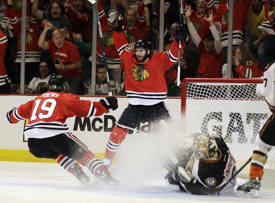 Chicago Blackhawks left wing Brandon Saad celebrates his goal against Anaheim Ducks goalie Frederik Andersen with Jonathan Toews during the second period in Game 6 of the Western Conference