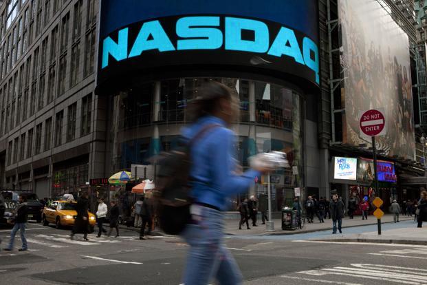 Nasdaq extends record on Google energy weighs on S&P 500 index