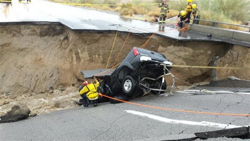 CAL FIRE  Riverside County Fire Department emergency crews respond after a pickup truck crashed into the collapse of an elevated section of Interstate 10 Sunday