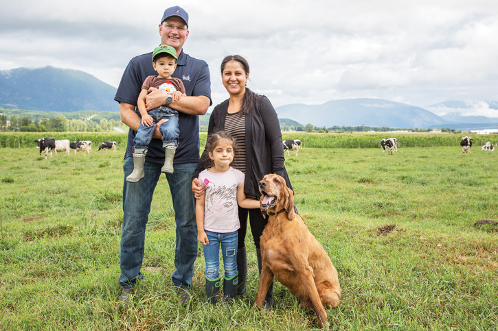 On the land The Mc Leod family – Jack two-year-old Ross Dil five-year-old Jasmine and dog Murphy – take time on Saturday July 25 to pose in the pasture on their organic dairy farm.- Evan Buhler  Observer