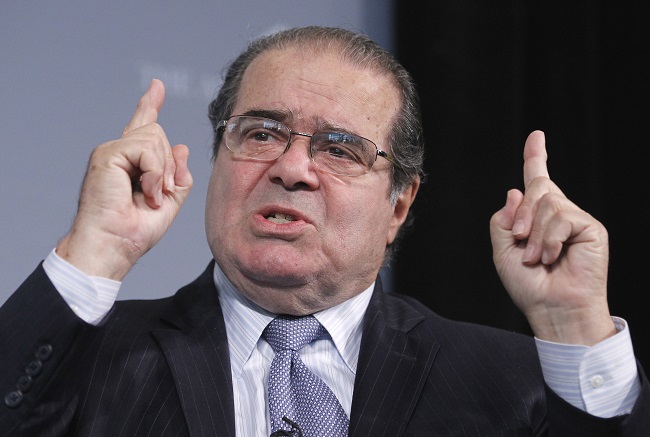 Supreme Court Justice Antonin Scalia participates at the third annual Washington Ideas Forum at the Newseum in Washington. Scalia and Attorney General Eric Holder are scheduled to speak at an American Bar Associatio