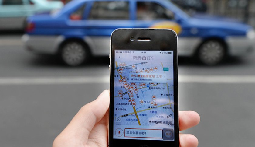 TencentA person uses taxi hailing app Didi Kuaidi in Shanghai China