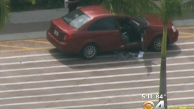 The maroon Suzuki Forenza that a shooting victim was in when he was dropped off at a Wal Mart in Miramar Florida